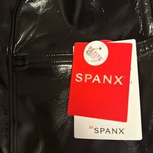 Spanks shiny leather leggings